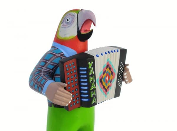 Nahual Parrot Music Band, Oaxacan Carvings by Avelino Perez, accordion player close up