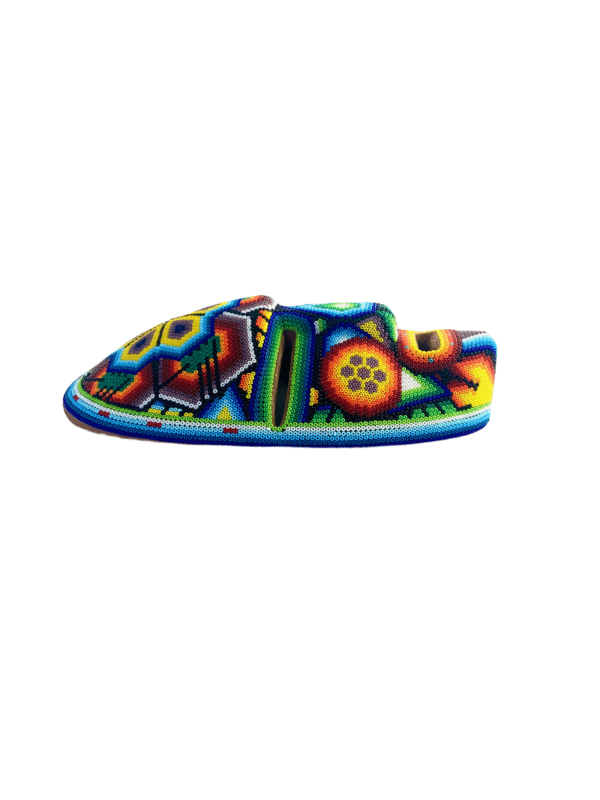 Huichol bead art mask small with yellow flower side view